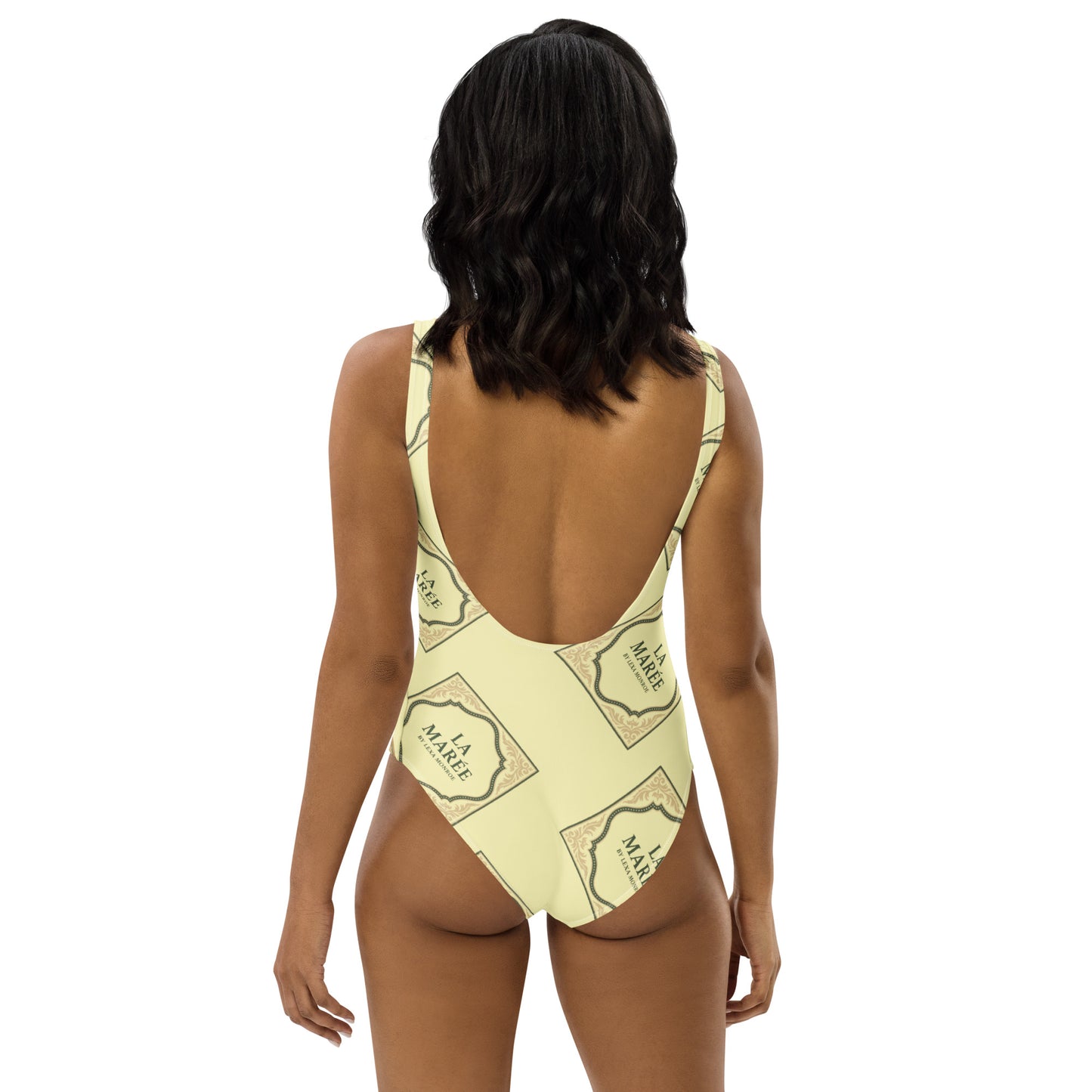 Elegant, sleek and stylish swimwear one-piece swimsuit with a low back by La Marée, designed for a flattering silhouette and coastal style.