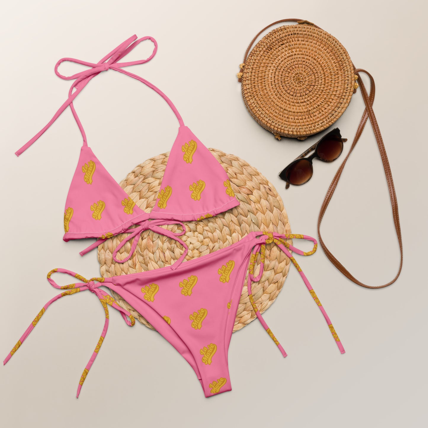 Luxury two-piece string tie bikini by La Marée in pastel tones ideal for sunkissed summer style, designed for coastal escapes and beachwear elegance and a flattering fit